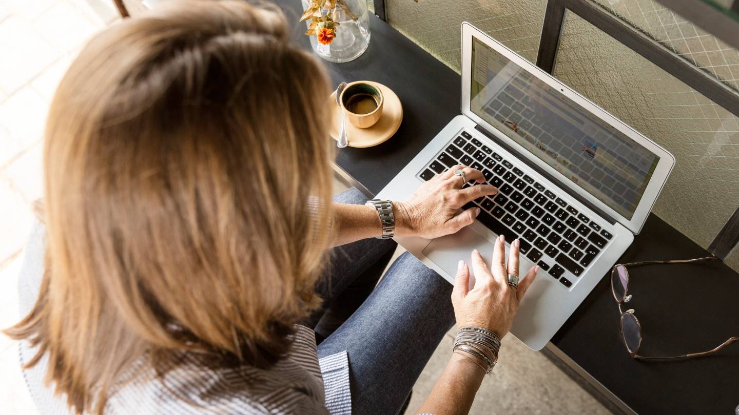 Woman typing on laptop